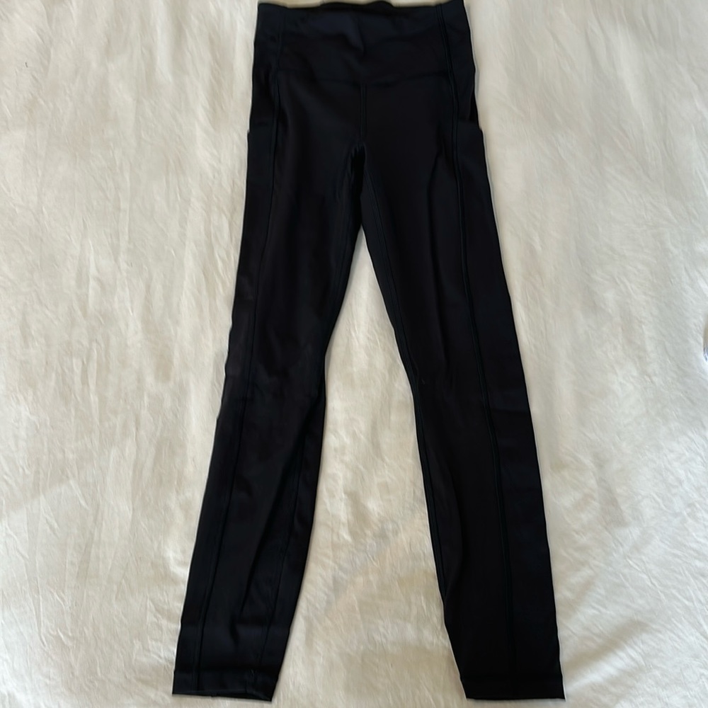 Black Athleta 7/8 Stash Pocket Leggings